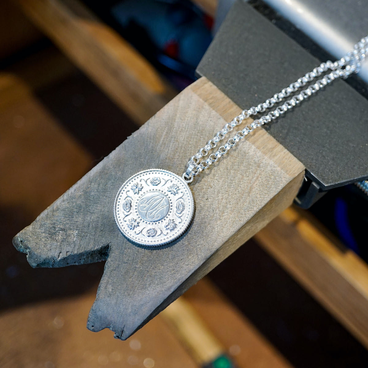 Picture of handmade Brave Edith Precious Pendant on Jewellery bench peg