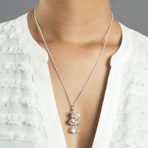 woman wearing medium silver padauk necklace 