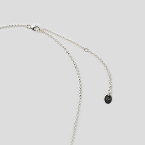 clasp of silver necklace on white background