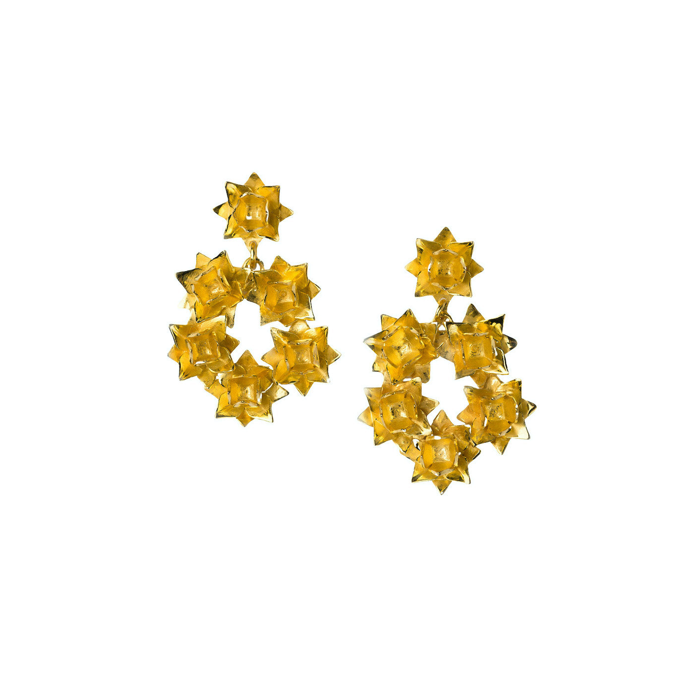 gold lotus wreath earrings on white background
