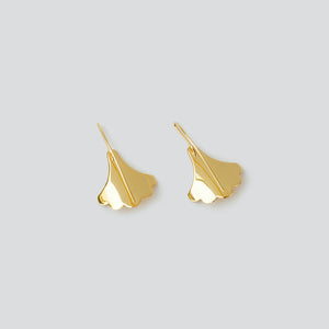 Polished backs of Plume Hook Earrings in 18K gold vermeil on white background