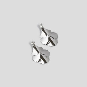 back of silver large plume fan earrings on white background